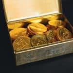 tin box full of gold coins